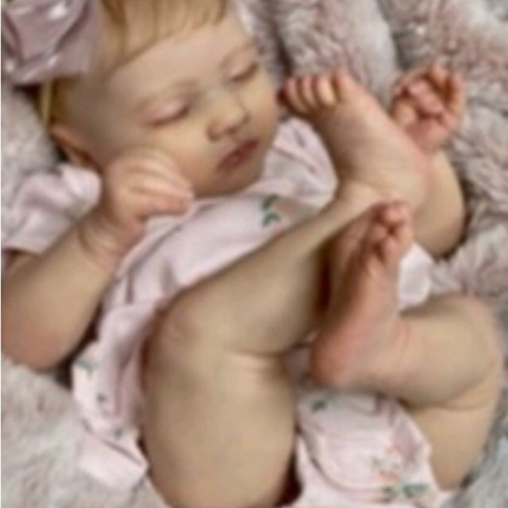 Realistic Baby Doll in Pink Outfit